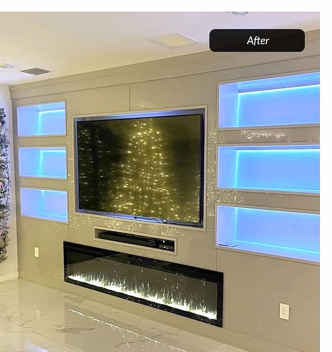 After: lit media wall with fireplace